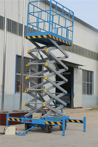 Plateforme élévatrice mobile à ciseaux avec roues flexibles et <span class=keywords><strong>table</strong></span> de travail stable pour <span class=keywords><strong>la</strong></span> maintenance aérienne en intérieur - Product Image 4