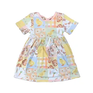 The latest summer short sleeve back cross design pale yellow chick flower pattern girls fashion dress