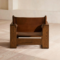 Fauteuil lounge scandinave moderne en bois massif vieilli et cuir, design créatif, style mi-siècle, pour salon ou salle de thé