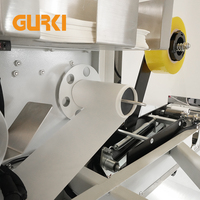 Machine de scellage et d'étiquetage automatique de cartons de boissons GURKI GPETB-40 avec ruban adhésif électrique, entraînement supérieur et inférieur