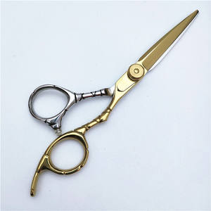 Tijeras de peluquería Inoue Huojian de 6.0 pulgadas, doradas, para entresacar, para diestros, de acero inoxidable DR56 - Product Image 1