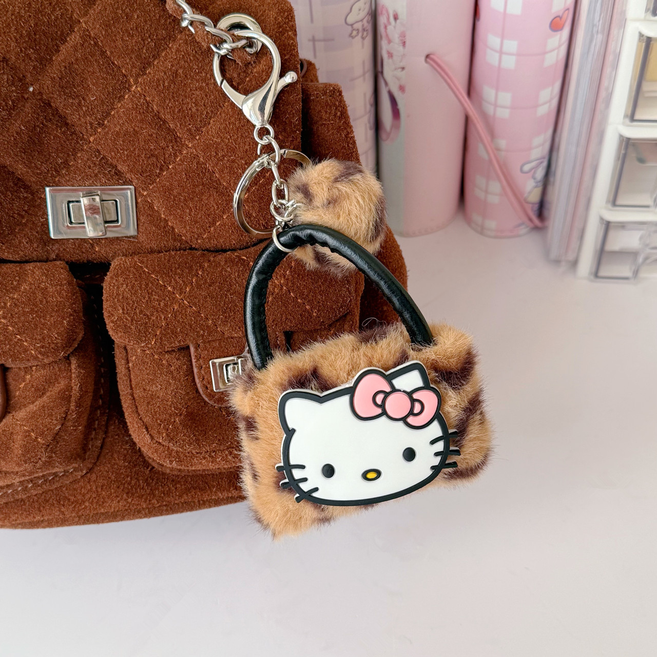 Porte-clés sac léopard kt noeud poudre cuir blanc