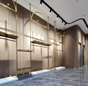 Étagère de présentation murale réglable en acier inoxydable moderne, idéale pour l'affichage de vêtements – Vente chaude en usine - Product Image 1