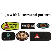 Patchs d'étiquettes en PVC souple personnalisés logo gravé Insigne en silicone Étiquette en caoutchouc Étiquette en silicone