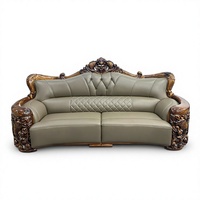 Ensemble de canapés en cuir véritable sculpté à la main de style européen moderne, avec cadre en bois, dossier capitonné, style royal de luxe léger, forme ovale, pour salon