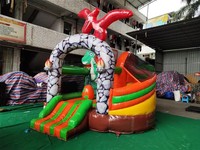 Château gonflable commercial dinosaure avec toboggan, combo château sauteur jungle pour location de fêtes d'enfants