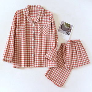 Set pigiama due pezzi a manica lunga a quadri da uomo e da donna - Product Image 2