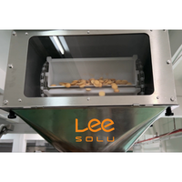 Machine d'emballage automatique de biscuits avec peseur à 14 têtes et élévateur à godets |   Machine d'emballage pour l'industrie alimentaire