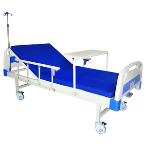 Lit médical manuel Snow S-12 avec table relevable pour usage domestique et hospitalier - Product Image 1