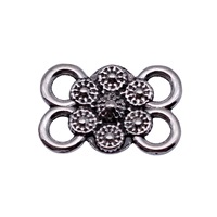 Connecteur en alliage à 4 boucles motif marguerite à pois 15x10mm pour bracelet à chaîne superposée