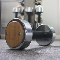 Produits brevetés Équipement de fitness à domicile mode ronde chromée avec pièce de bois haltères en acier inoxydable haltères