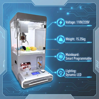 Mini machine à griffes en métal durable pour centre de jeux d'arcade et centre commercial, idéale pour les jeux de poussée de pièces et les jouets en peluche.