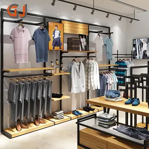 OEM Free Standing Garment Rack Display For Clothes Metal Wooden Adjustable Men's Women Clothing Store Furniture Design