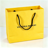 Fournisseur de sacs en papier jaunes pour cosmétiques, emballages cadeaux, mode, maquillage, parfums, design boutique de luxe, sur mesure