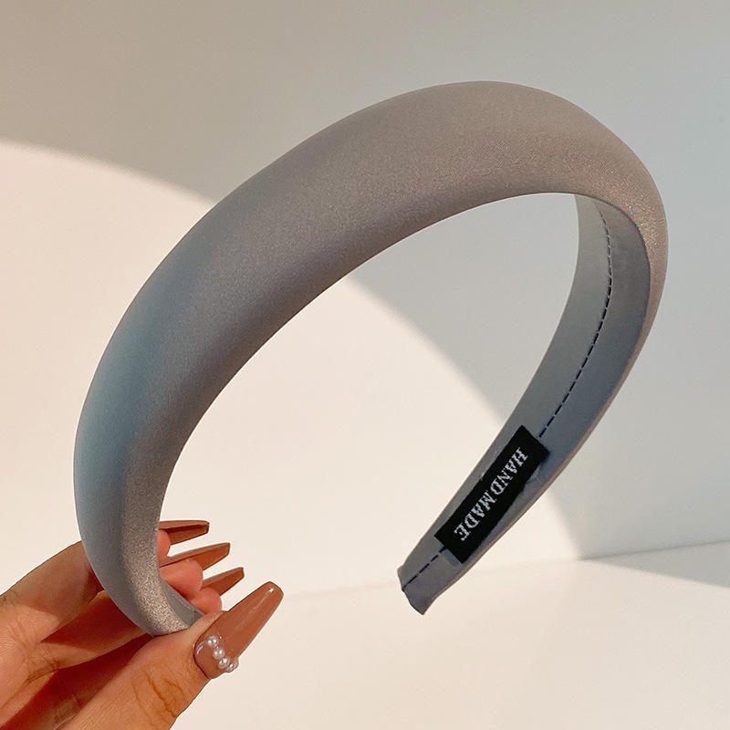 2 gray sponge headbands