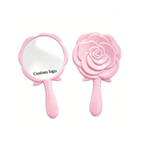 Miroir en forme de rose Un miroir miniature mignon et portable pour filles Parfait pour les voyages ou l'usage quotidien Un miroir de maquillage compact et élégant.