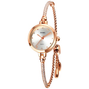 Montre de luxe pour femme SKMEI, style bracelet, or rose, quartz, cadran en verre, tendance pour les affaires - Product Image 1