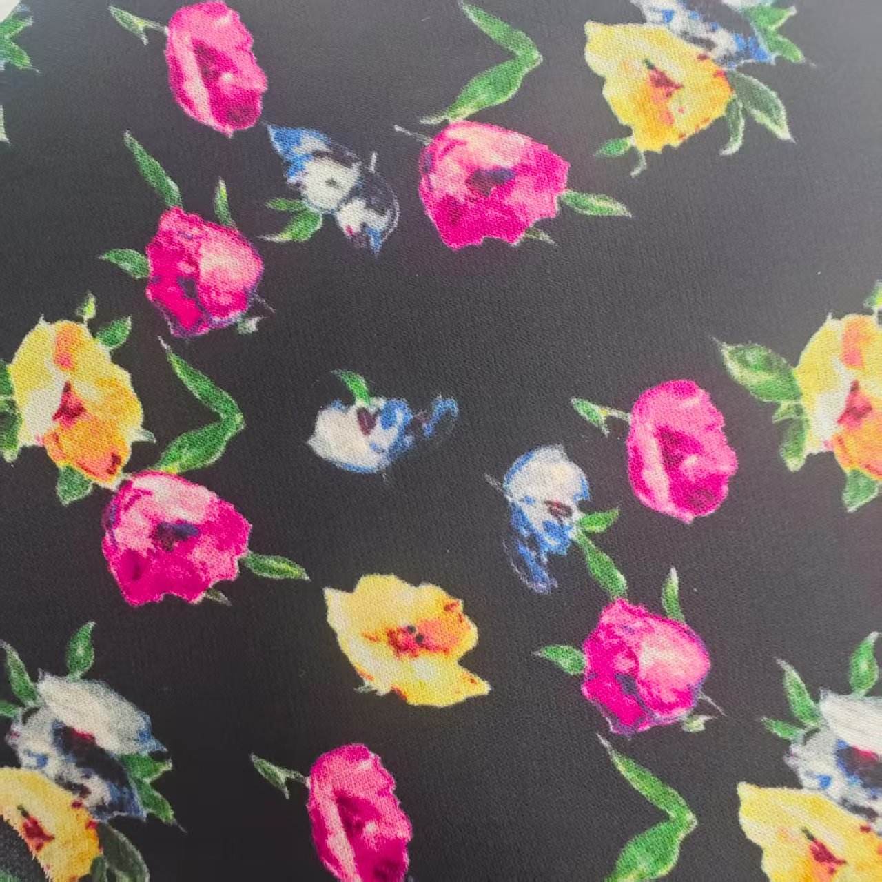 Black with yelllow red blue flower