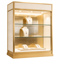 Vitrine à bijoux moderne sur mesure, haute, avec cadre doré, éclairage LED, vitrine en verre pour boutique, vente en gros