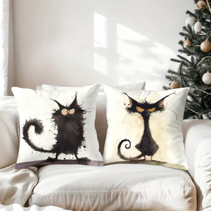Set empat bantal hiasan berbentuk kucing hitam yang unik dengan dekorasi liburan yang meriah di latar belakangnya. - Product Image 3