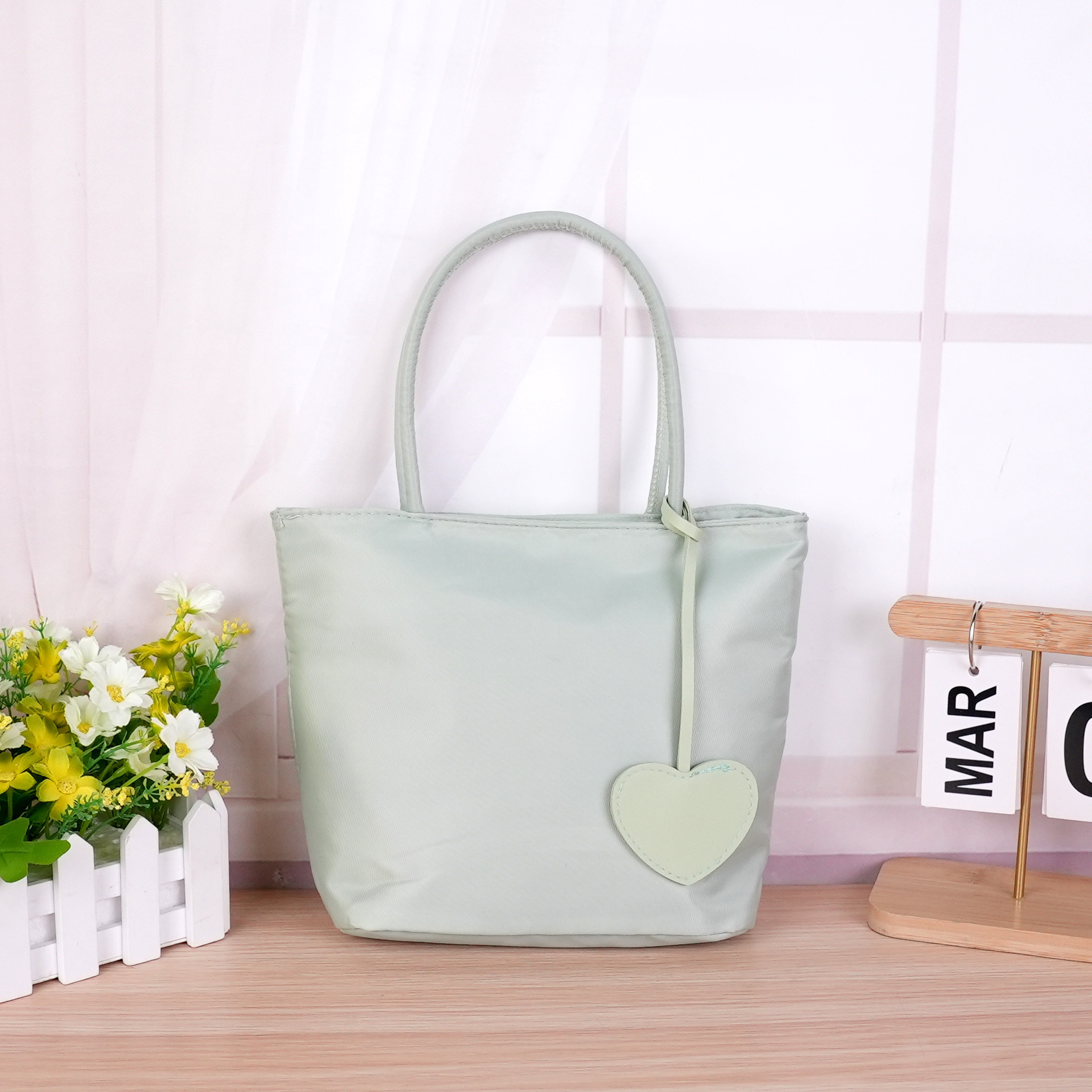 Sac simple vert [porter à deux mains]