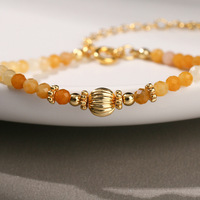 Bracelet ethnique tendance en cuivre avec disques, cristaux colorés et perles de pierres naturelles à facettes, idéal pour un anniversaire
