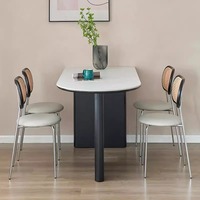 Table à manger ovale noire de style moderne du milieu du siècle avec structure en métal et plateau en ardoise, ensemble de chaises pour salon, 4 places