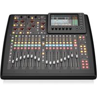 Mezclador de audio digital Behringer X32 Compact de 40 canales con grabación USB y efectos integrados para sonido en vivo y uso en estudio.
