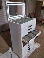 Vitrine à lunettes LED verrouillable en cuir gris avec tiroirs pour magasin de détail