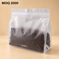 Sachets à fond plat noir mat avec doublure en aluminium et valve, sacs à café personnalisés pour l'emballage de grains torréfiés de spécialité