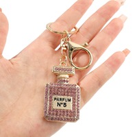 Bouteille de parfum diamant pendentif porte-clés Logo personnalisé strass parfum voiture porte-clés breloques sacs à dos porte-clés Offre Spéciale