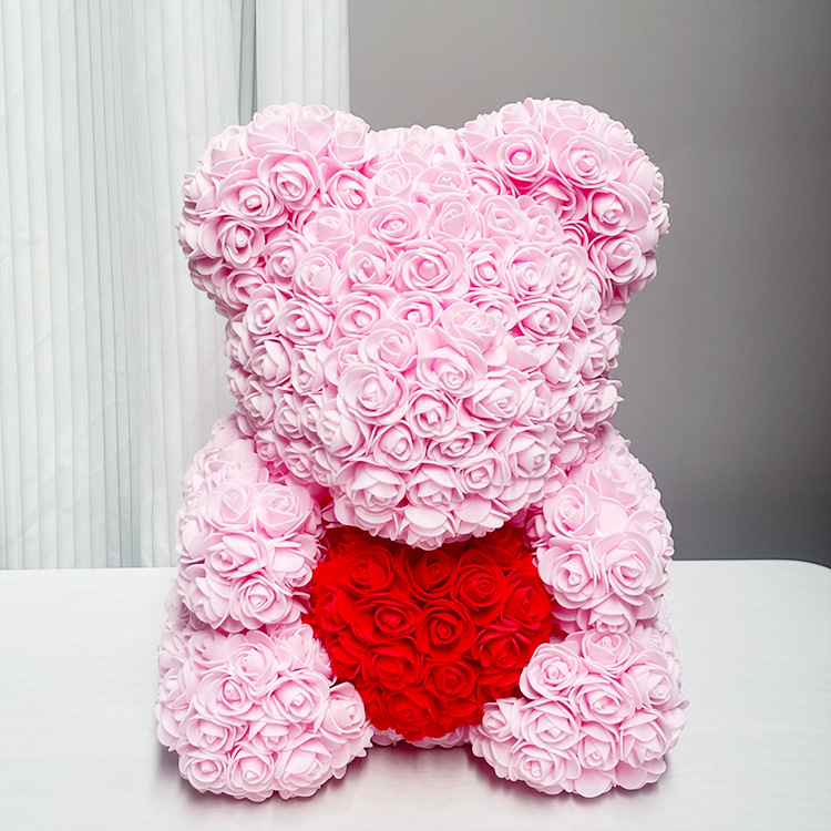 Shallow pink bear with red heart