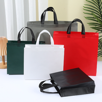 Sacs fourre-tout non tissés stratifiés pressés à chaud Sacs cadeaux publicitaires Sacs en plastique en gros Magasin de vêtements