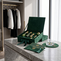 Boîte rigide de luxe personnalisée en velours vert foncé avec ruban et insert floqué pour kit de cosmétiques et produits de soin de la peau