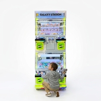 Distributeur de poupées intelligent multi-stations pour 4 joueurs avec grue à grande vitesse pour les centres de divertissement modernes