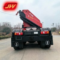 Grue articulée hydraulique montée sur camion Jiangwei SQ560ZB6+1 14T, portée 18,25 m avec flèche de rehaussement sur châssis CLW