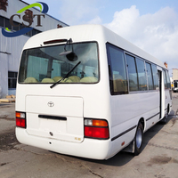 Voitures d'occasion de haute qualité remises à neuf T-o-y-o-t-a Coaster Kowloon Motors 21 places Véhicule léger pour passagers Mini-bus à vendre