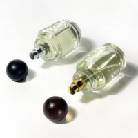 Haute qualité personnaliser bouchon clair plat rond parfum bouteille en verre bouteille d'huile essentielle bouteille de parfum de luxe 100ml
