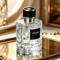Vente en gros de flacons de parfum en verre cylindriques de luxe de 100 ml, flacon pulvérisateur vide, logo personnalisé avec boîte cadeau