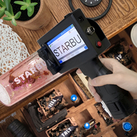Mini codeur de lot portable à jet d'encre continu (CIJ) alimenté par batterie 600 dpi pour codage rapide de lots, dates de péremption, numéros TIJ sur œufs et autres surfaces flexibles
