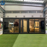 Cabine préfabriquée moderne extensible à double aile pliante, maison conteneur en acier respirant de 20 pieds ou 40 pieds, garantie 1 an