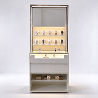 Vitrine d'exposition de montres avec cadre doré, éclairage LED, supports en acrylique, tiroirs et étagère ouverte, certifiée CE ETL, pour les boutiques de montres
