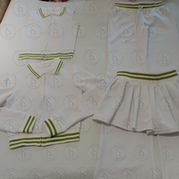 Ensemble 2 pièces pour femme : Veste polo sans manches et jupe en coton doux, style Y2K, avec logo personnalisé, idéal pour le golf et les tenues de villégiature.