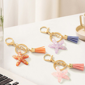Porte-clés Étoile de mer en cristal avec pendentif pompon, impression UV couleur intégrale, pour sacs d'école et accessoires de clés pour femmes - Product Image 3