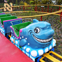 Mini montagnes russes en forme de requin Nova Rides pour enfants - Construction en acier et fibre de verre, équipement extérieur, manège de montagnes russes requin