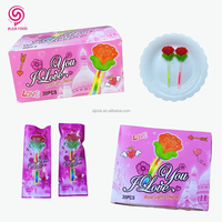 Vente en gros usine 30 pièces Sucettes phosphorescentes en forme de rose Bonbons fluorescents Faveurs de fête de la Saint-Valentin Remplissage fruité dur