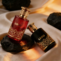 Venta al por mayor de envases de lujo de vidrio negro para perfume, vacíos, con pulverizador de 30ml, 50ml, 100ml, 200ml, con grabado personalizado y tapa de Zamac dorada.