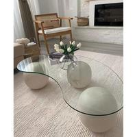 Table basse créative en verre trempé avec cadre en acrylique, design circulaire, couleur crème moderne, simple, non pliable, meubles de salon