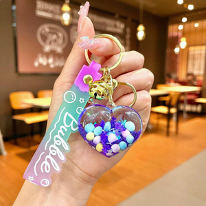 Acryl olie gevulde vloeibare zandfles dolfijn walvis sleutelhanger lichtgevende sneeuwvlok drijfles prachtige kinderrugzak auto - Product Image 6