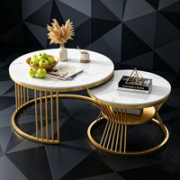 Ensemble de tables basses rondes modernes de luxe avec plateau en pierre frittée grise et structure en métal doré pour salon